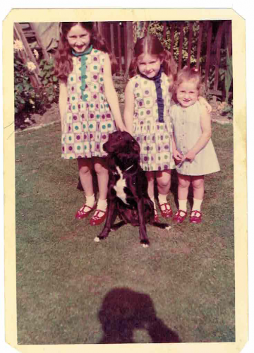3 sisters, 2 in spotted dresses, I'm the one who wore both the dresses for years after they were handed down.